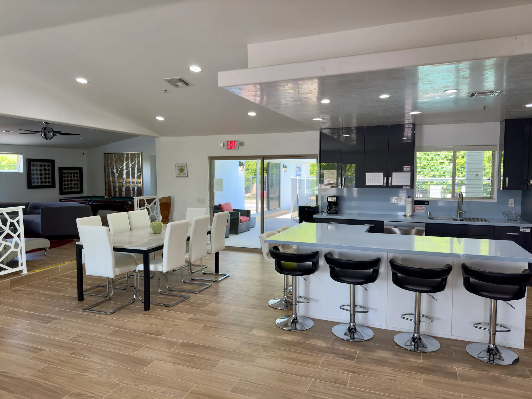 Open dining area connected to the residential kitchen at the Mental Wellness KS facility in Palm Springs