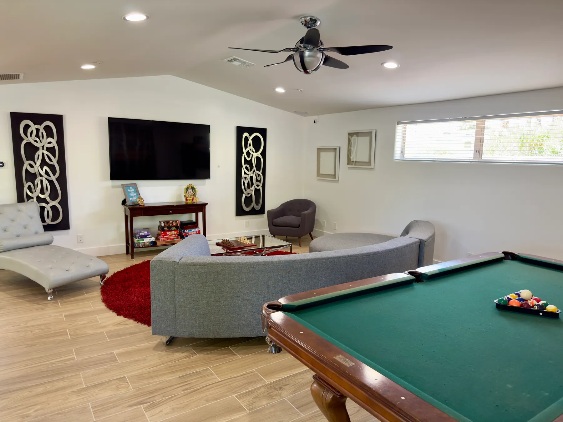 Group therapy room with comfortable chairs and natural light at the Mental Wellness KS residential mental health facility in Palm Springs