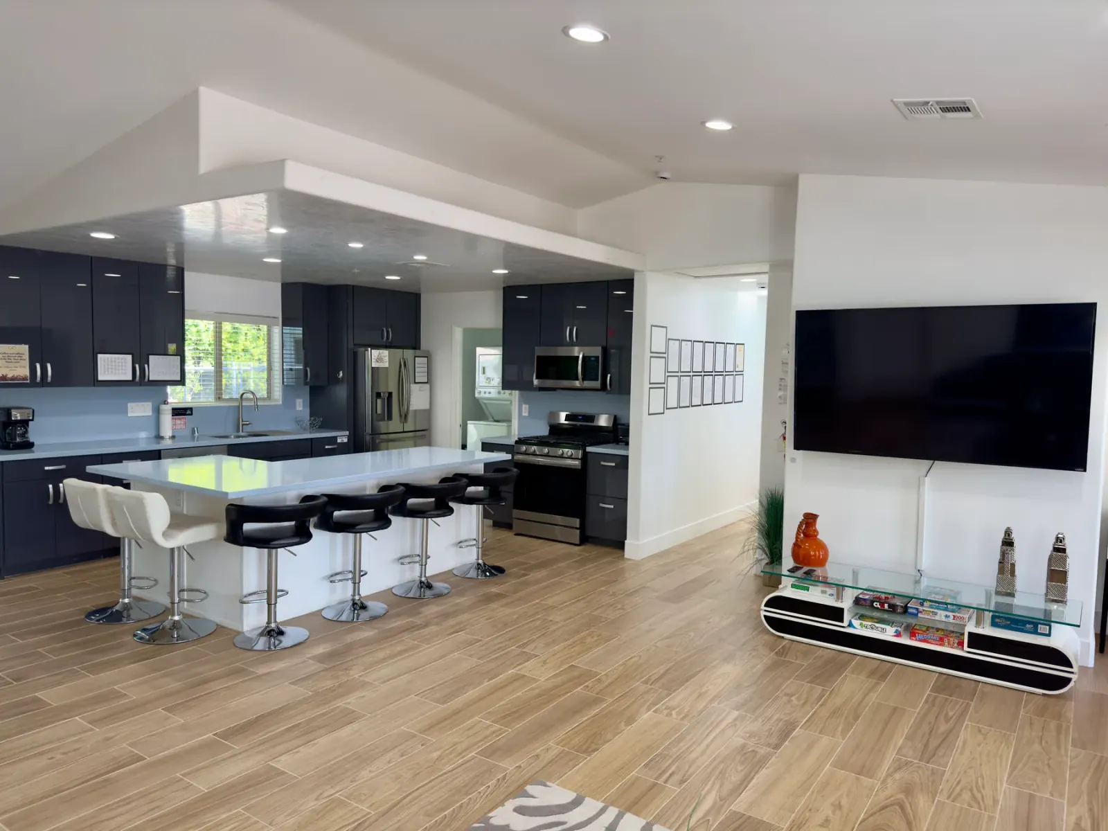 Open communal kitchen with island seating at the residential mental health facility